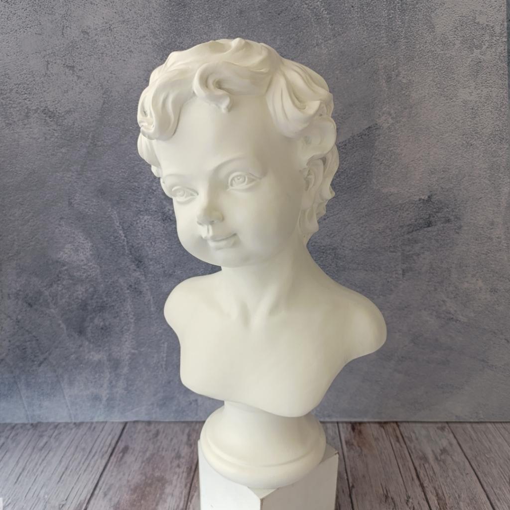 ESCULTURA NIÑO 27*37CM  _1